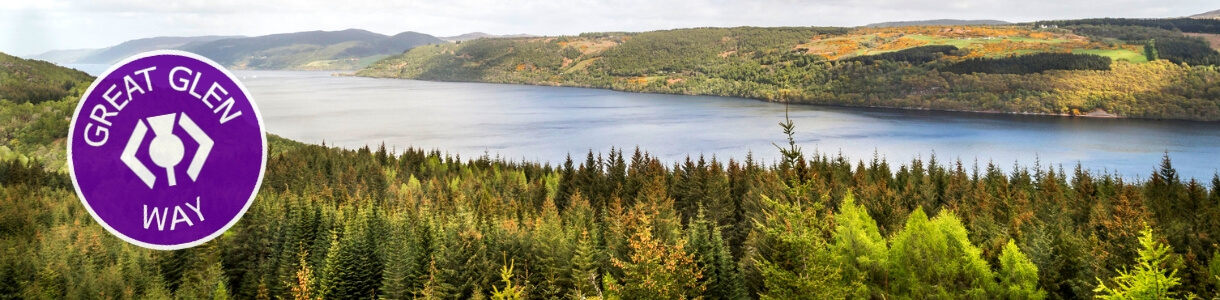 Taking a break from the Great Glen Way hiking trail on the shores of Loch Ness, Scotland